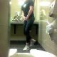 A hidden camera in a public restroom records a blonde girl wearing a "Staff" T-shirt. She sits down on the toilet, pissing and plop sounds are clearly heard, but no details of product can be seen. Over 1.5 minutes.